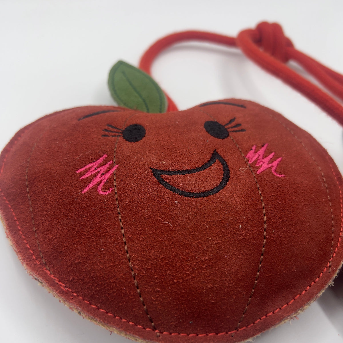 Horse and dog toy shaped as two cheeky cherries