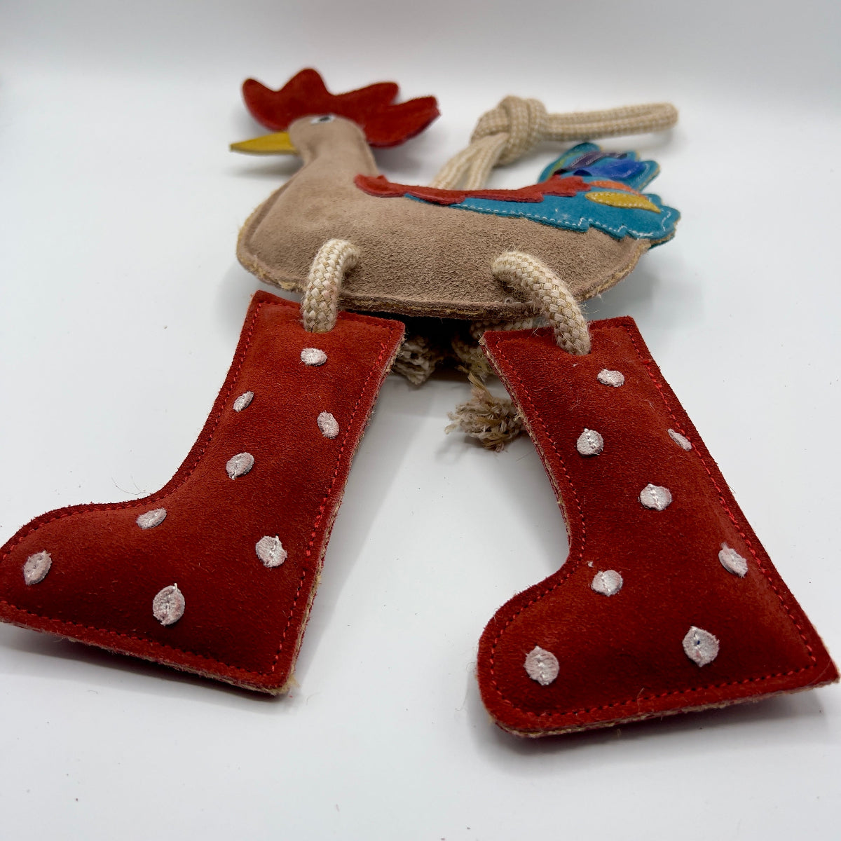 Rooster-shaped horse and dog toy with rope handle from green and wilds