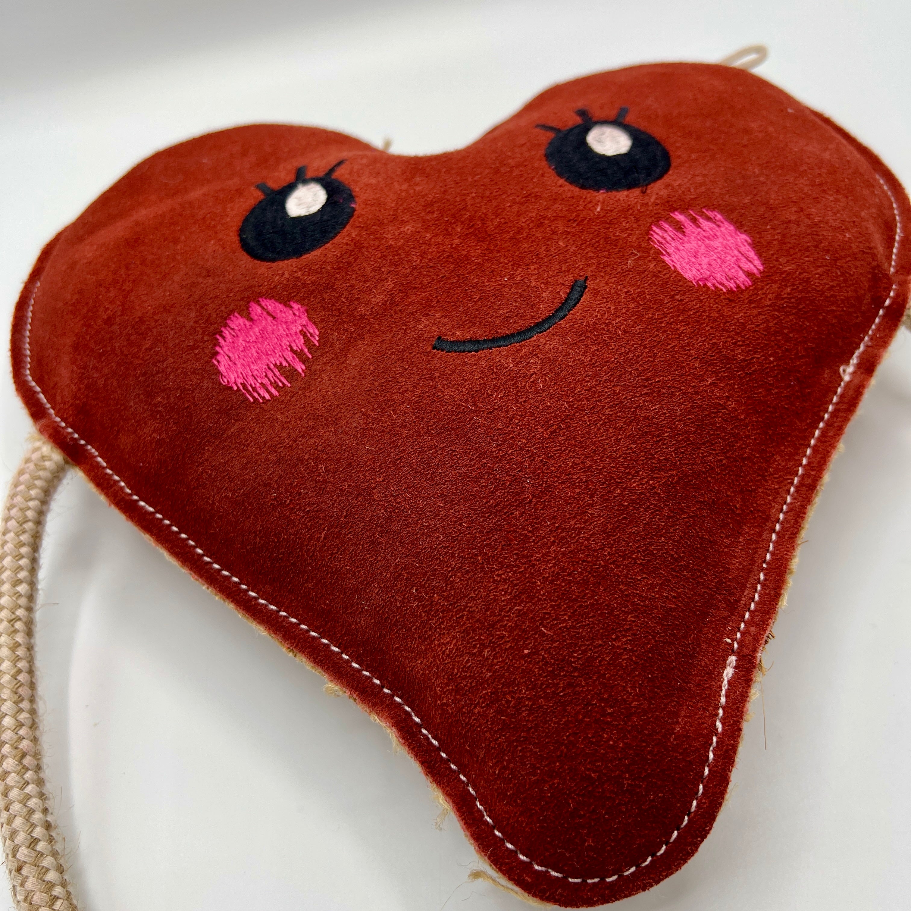 Eco friendly Heart-shaped dog toy with a face