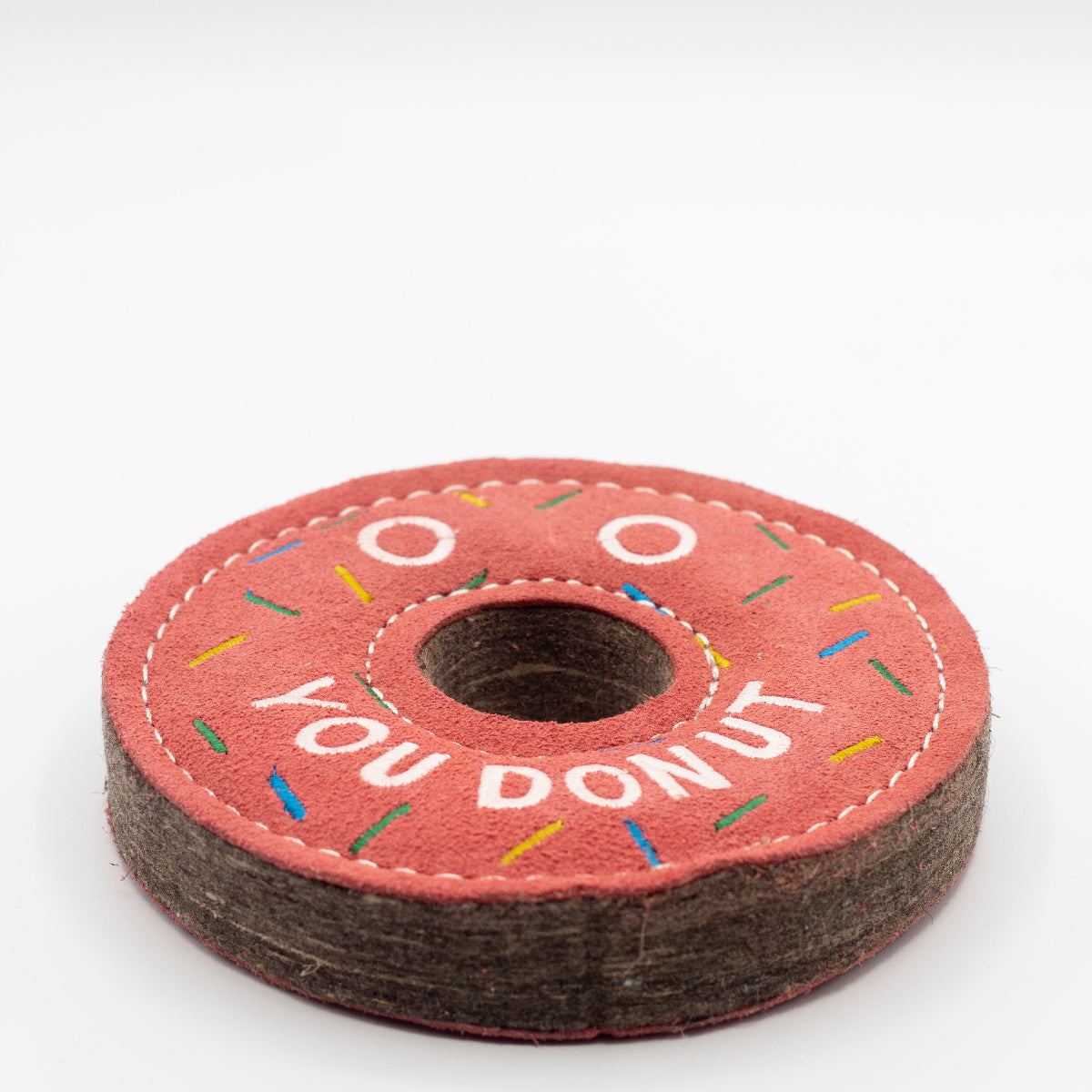 donut-shaped dog toy with 'You Donut' text and colorful sprinkles
