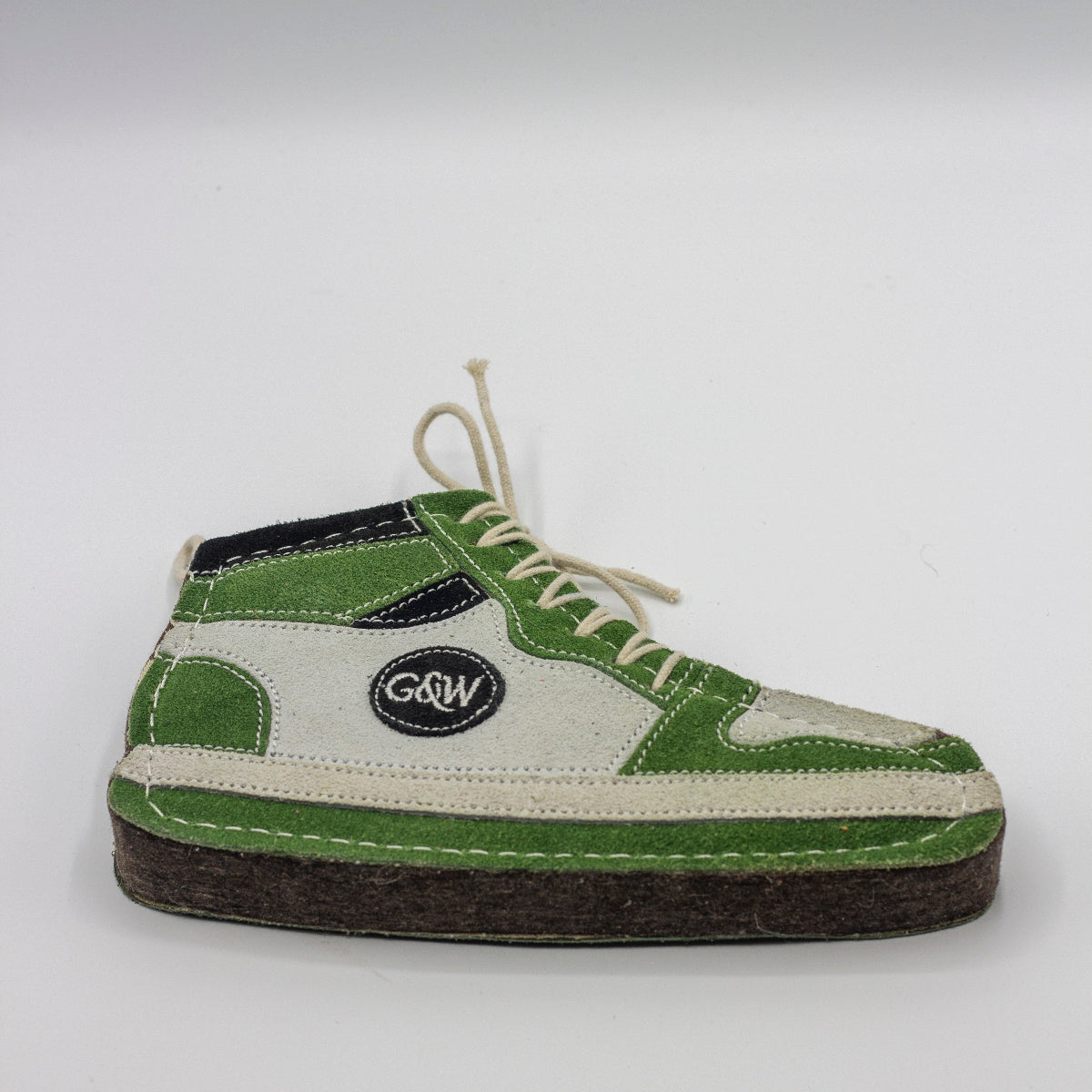 dog toy shaped of Green and brown sneaker with white laces