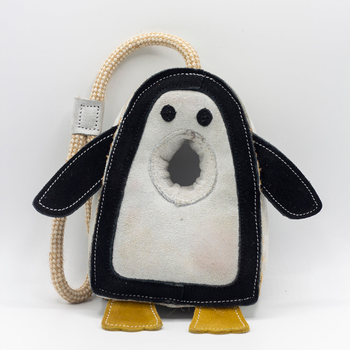 Penguin-shaped horse and dog toy with a rope from Green and Wilds