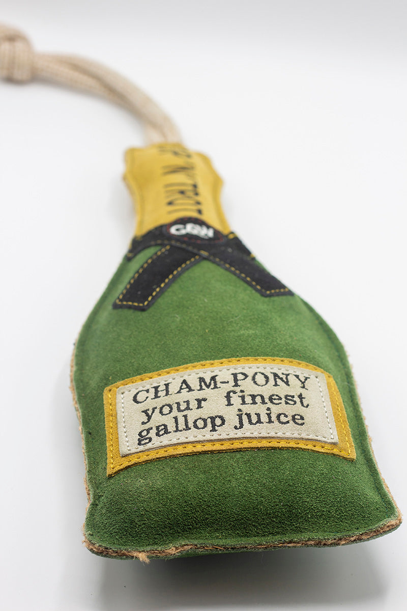 Horse and dog toy shaped like a champagne bottle with a label