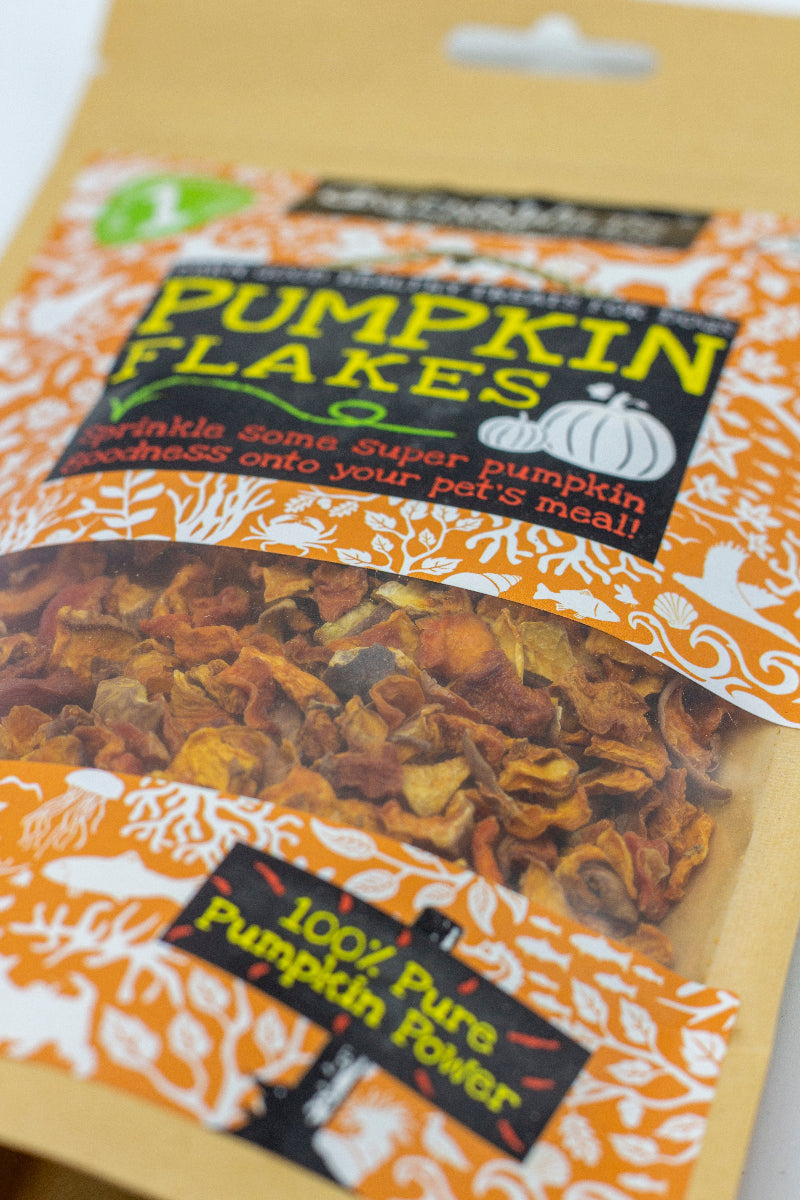 Package of Green & Wilds Pumpkin Flakes dog food supplement