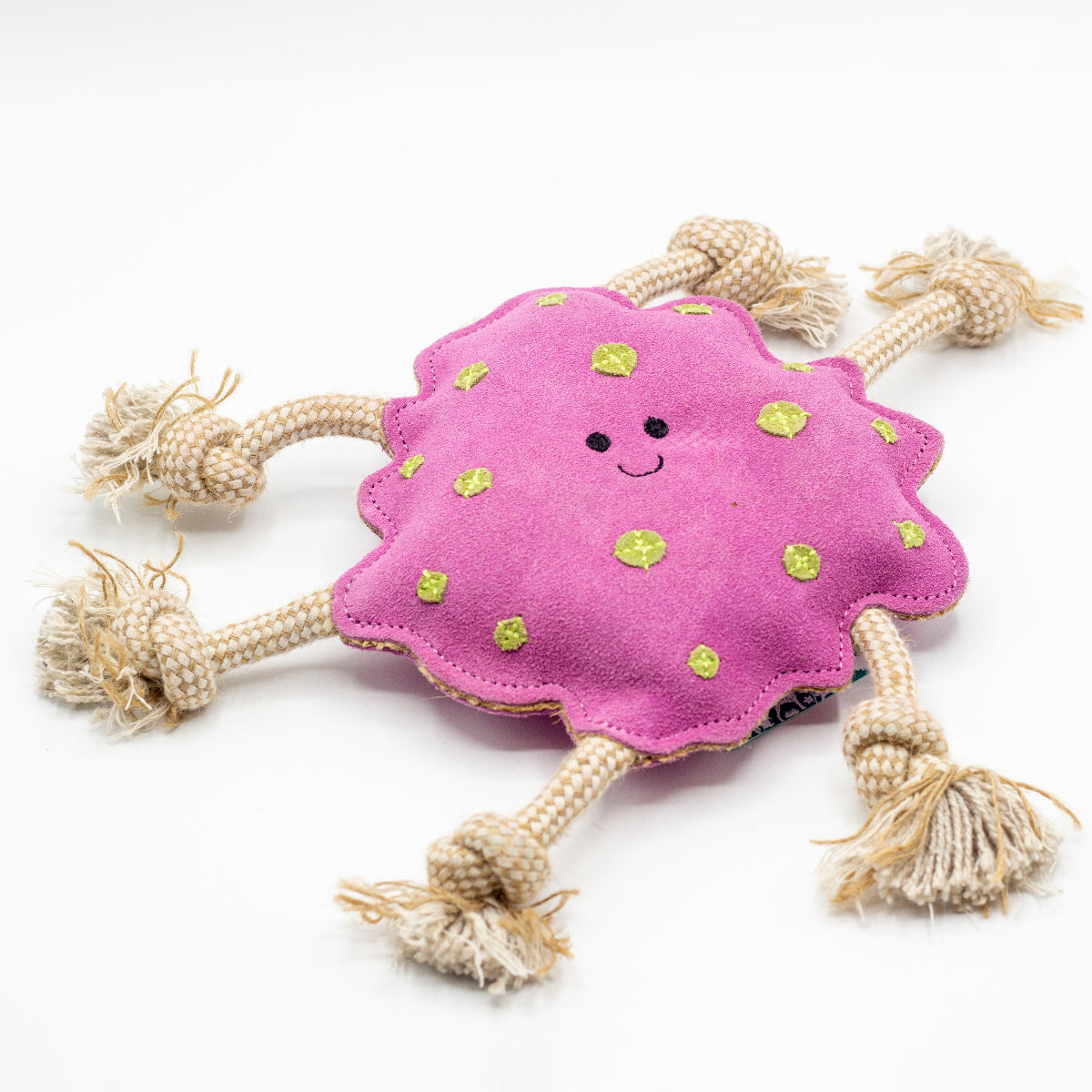 Pink suede dog toy with green spots and beige rope handles