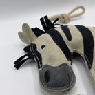 Zebra-shaped horse and dog toy with rope handle from green and wilds