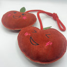 Horse and dog toy shaped as two cheeky cherries