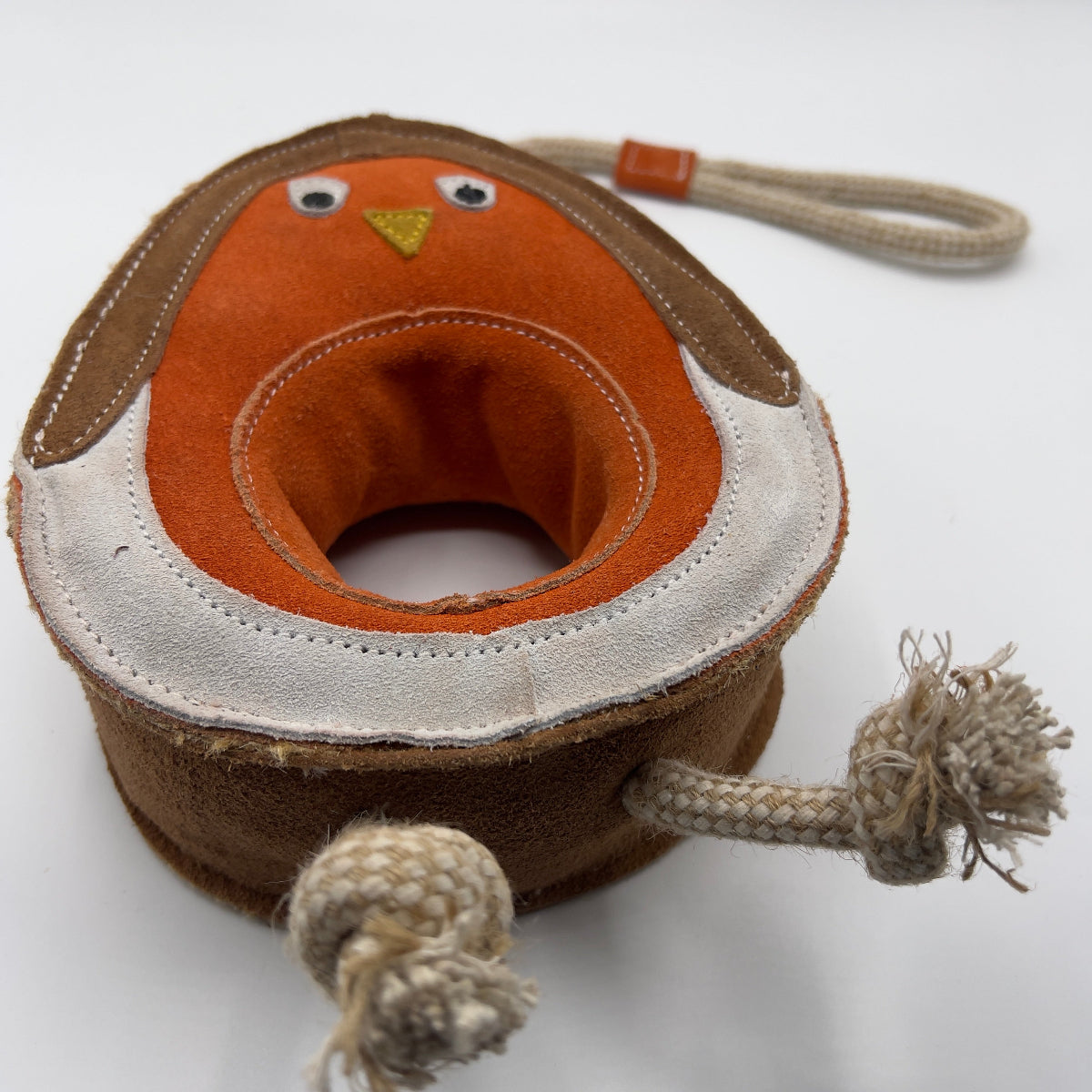 Dog toy shaped like a robin bird with a rope