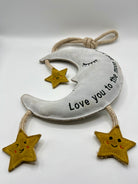 moon and star dog toy with text 'love you to the moon and back'