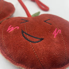 Horse and dog toy shaped as two cheeky cherries