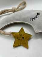 moon and star dog toy with text 'love you to the moon and back'