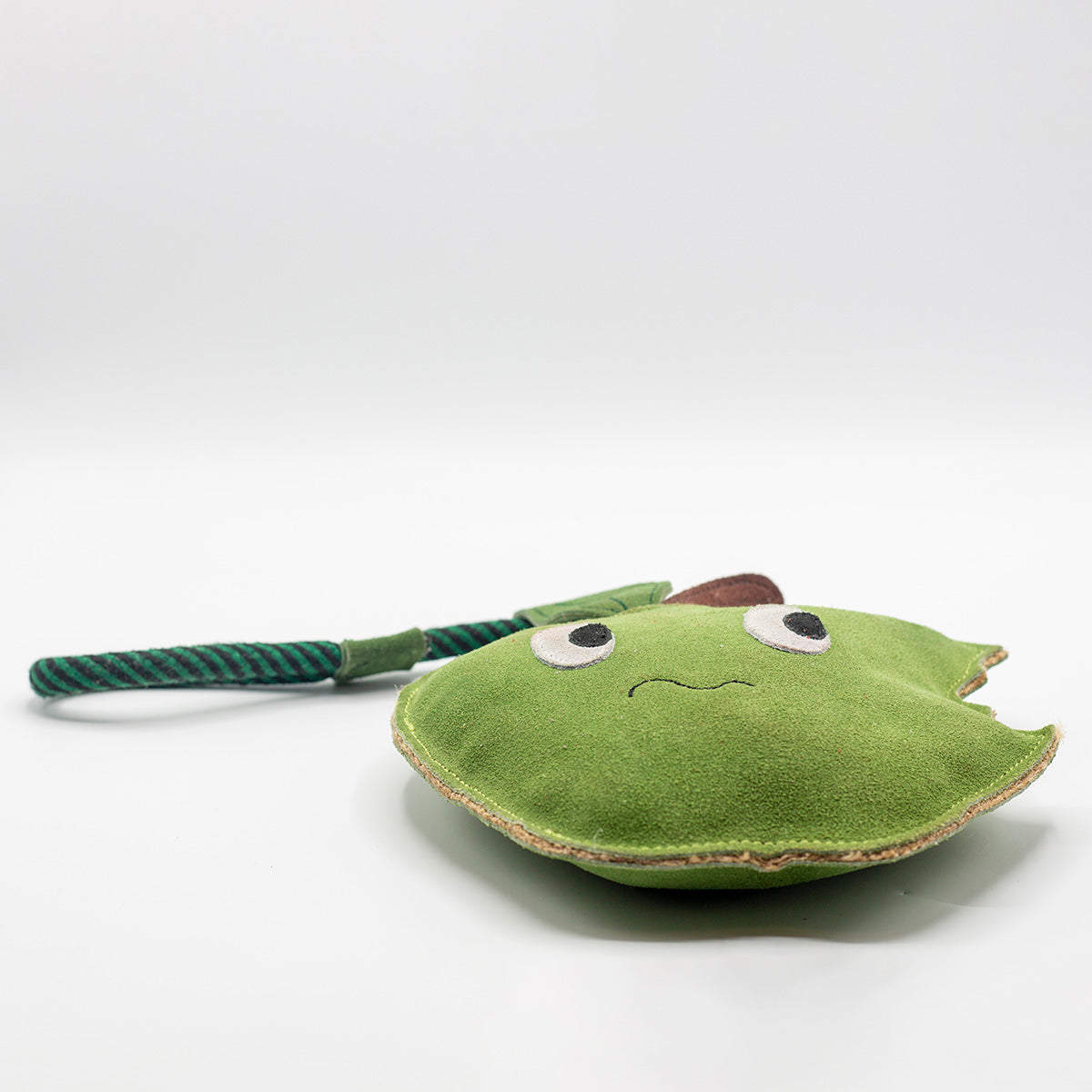 Horse and dog toy shaped as a nervous bitten green apple - green and wilds
