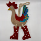 Rooster-shaped horse and dog toy with rope handle from green and wilds