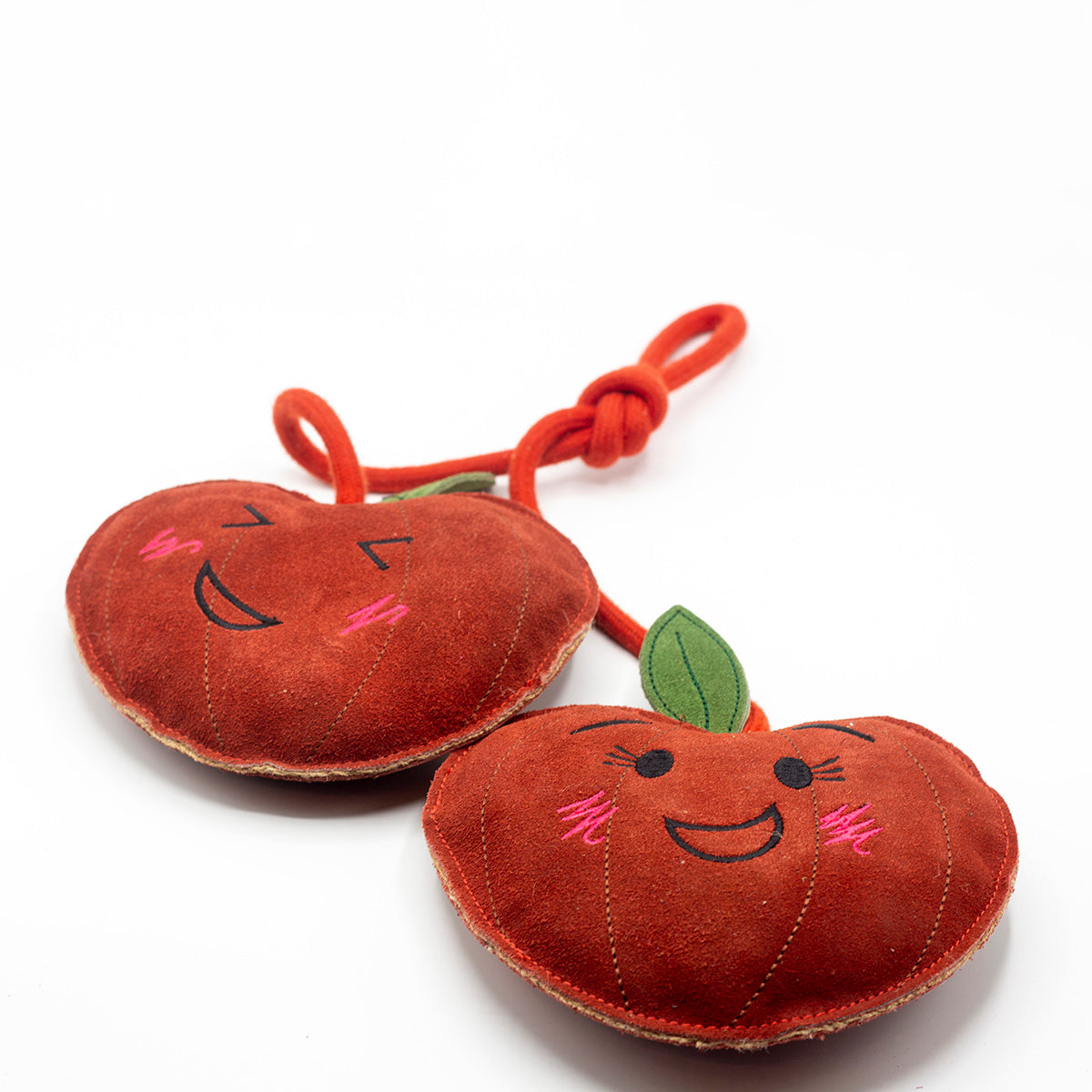 Horse and dog toy shaped as two cheeky cherries