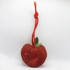 Horse and dog toy shaped as two cheeky cherries