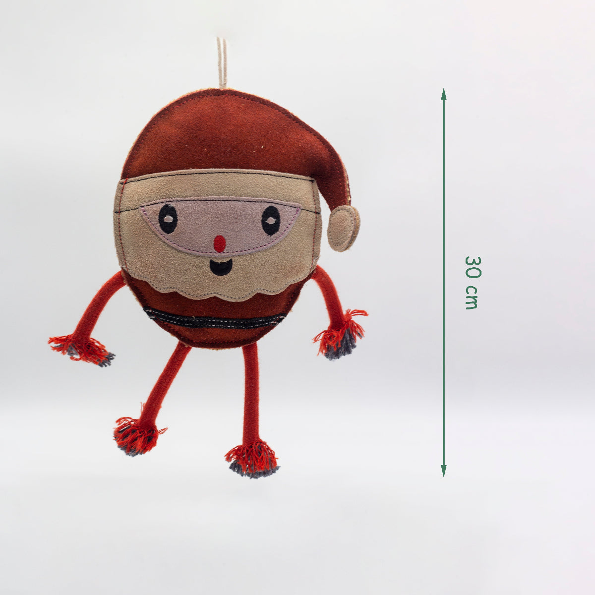 Christmas dog toy resembling the shape of a Santa
