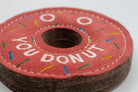 donut-shaped dog toy with 'You Donut' text and colorful sprinkles