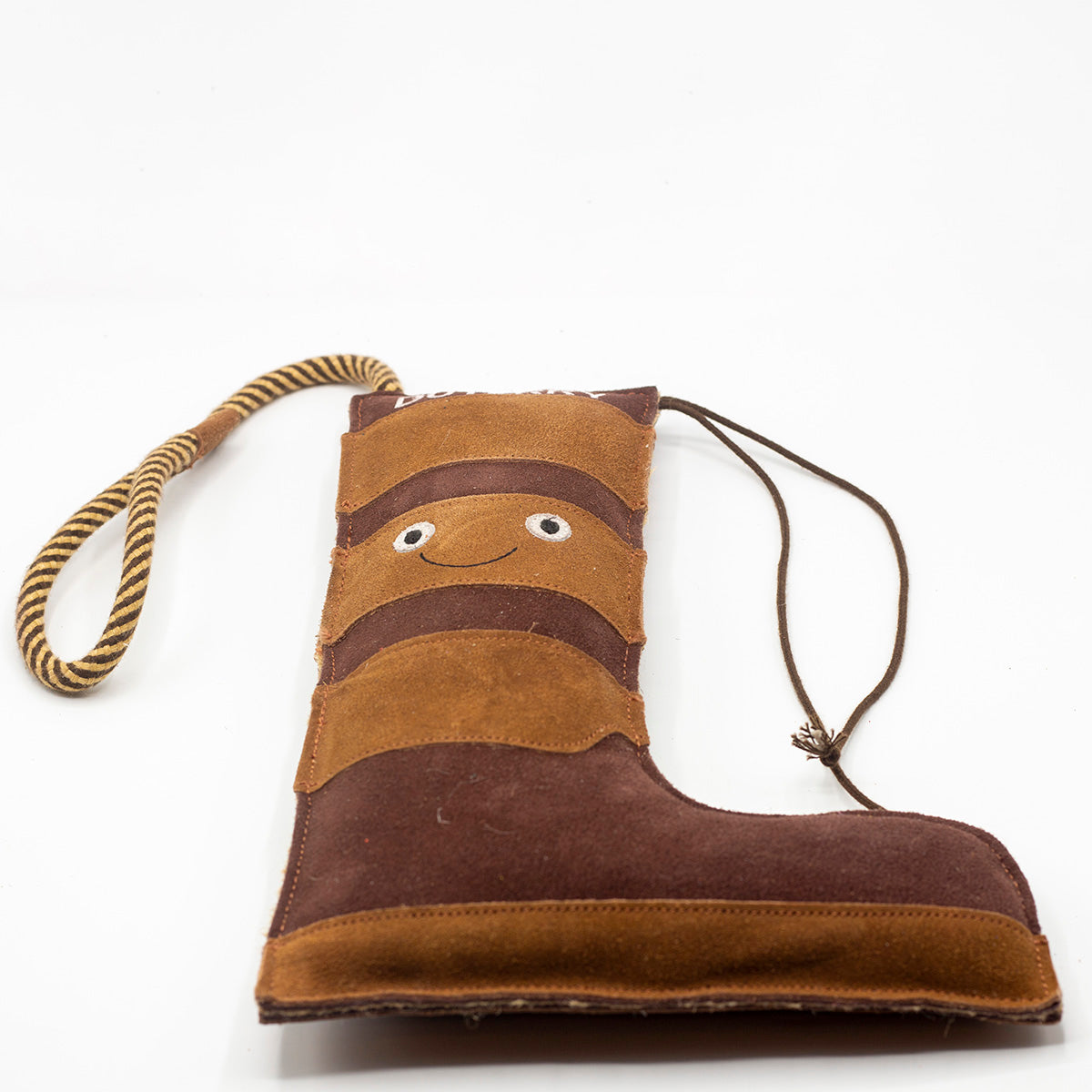 Brown boot-shaped dog toy with 'Duterry' written on it from green and wilds