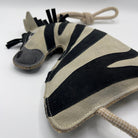 Zebra-shaped horse and dog toy with rope handle from green and wilds