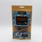 Package of Green & Wilds Christmas dog treats with a decorative label