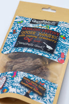 Package of Green & Wilds Christmas dog treats with a decorative label