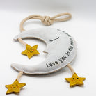 moon and star dog toy with text 'love you to the moon and back'