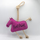 Pink horse-shaped horse and dog toy with 'PONY POWER' text and a rope from green and wilds