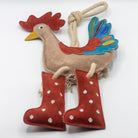 Rooster-shaped horse and dog toy with rope handle from green and wilds