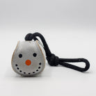 Small grey snowball-shaped Christmas dog toy with a black rope