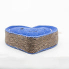 Heart-shaped blue eco friendly dog toy with a winky face