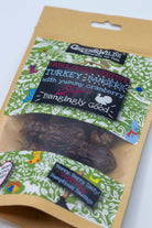 Package of Green & Wilds turkey treats with a decorative label on a white background