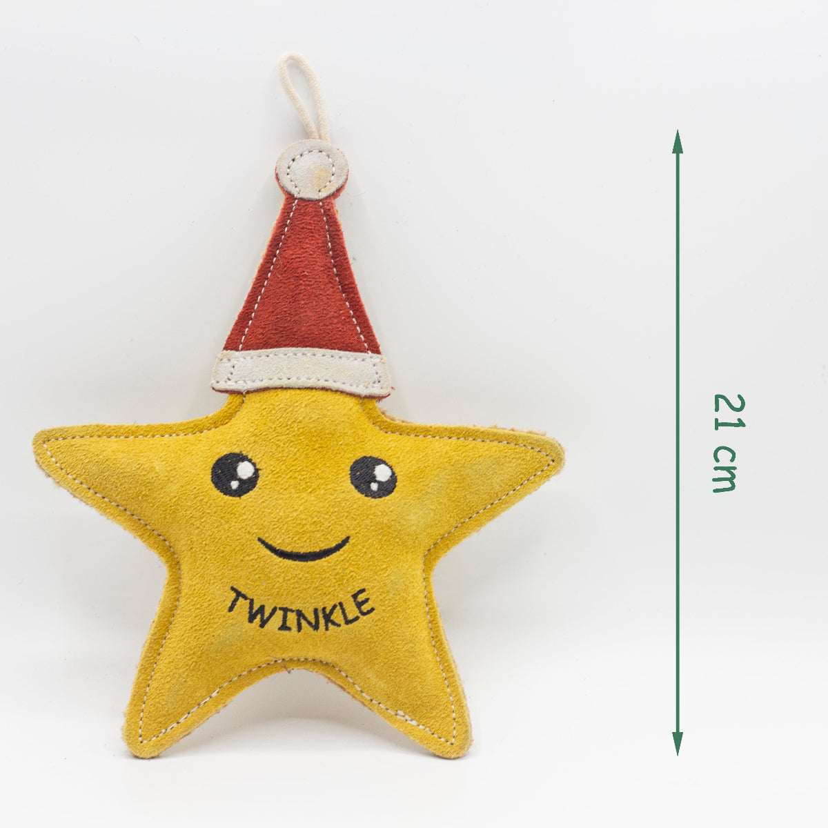 Star-shaped Christmas dog toy with a red Santa hat and 'Twinkle' text on a white background