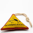 Triangle-shaped horse and dog toy with 'Warning Kicks!' warning sign and rope