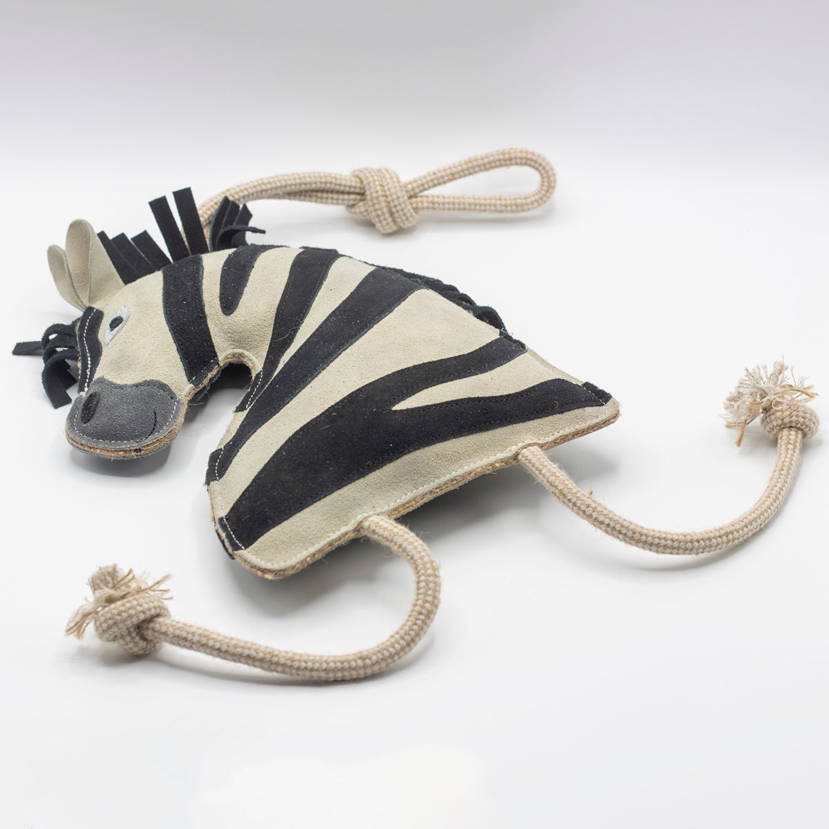 Zebra-shaped horse and dog toy with rope handle from green and wilds