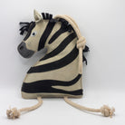 Zebra-shaped horse and dog toy with rope handle from green and wilds